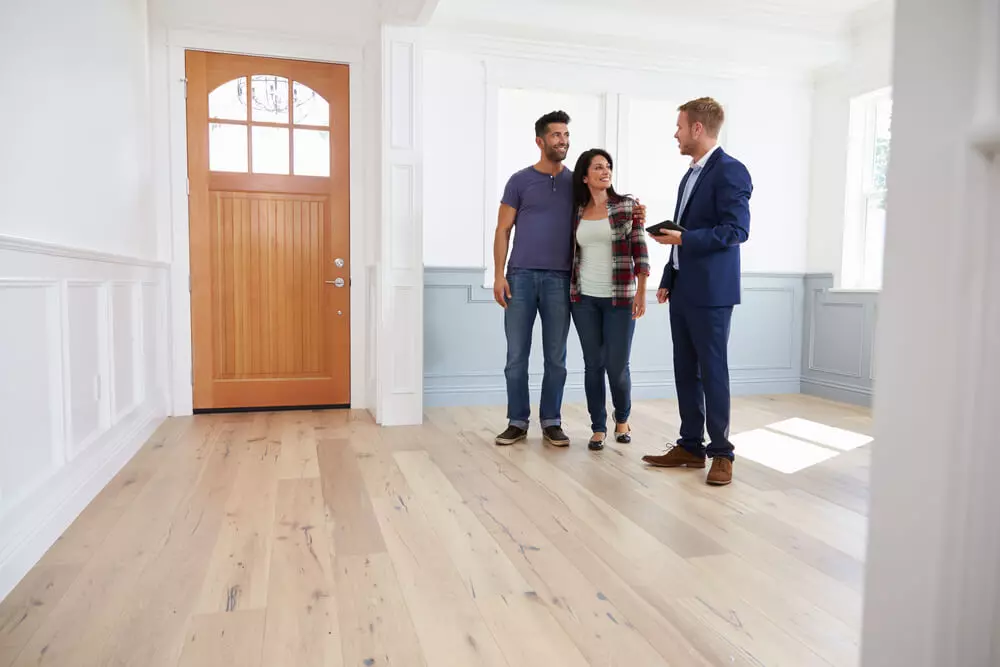 two people viewing a new house